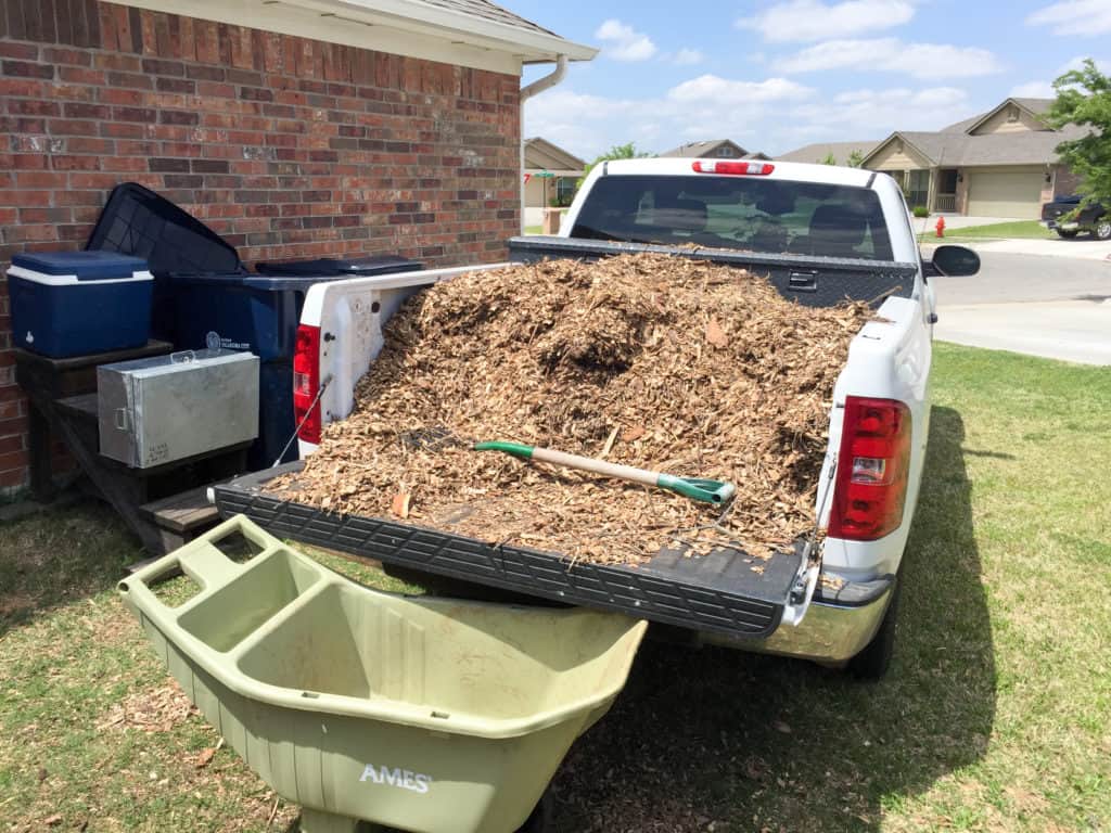 truck bed of wood chips